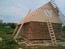 Дом 6х12м. из окоренного бревна с двускатной крышей